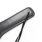 Bred paddle spanker med rem - sort