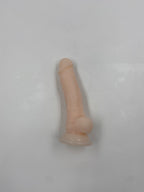 Blød dildo med kugler og sugekop.